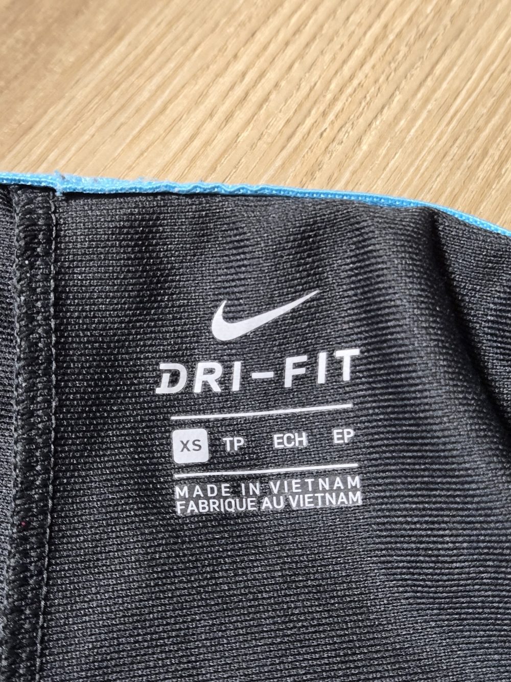 Nike Women’s Black Athletic Shorts with Bright Baby Blue Accents - Picture 3 of 4